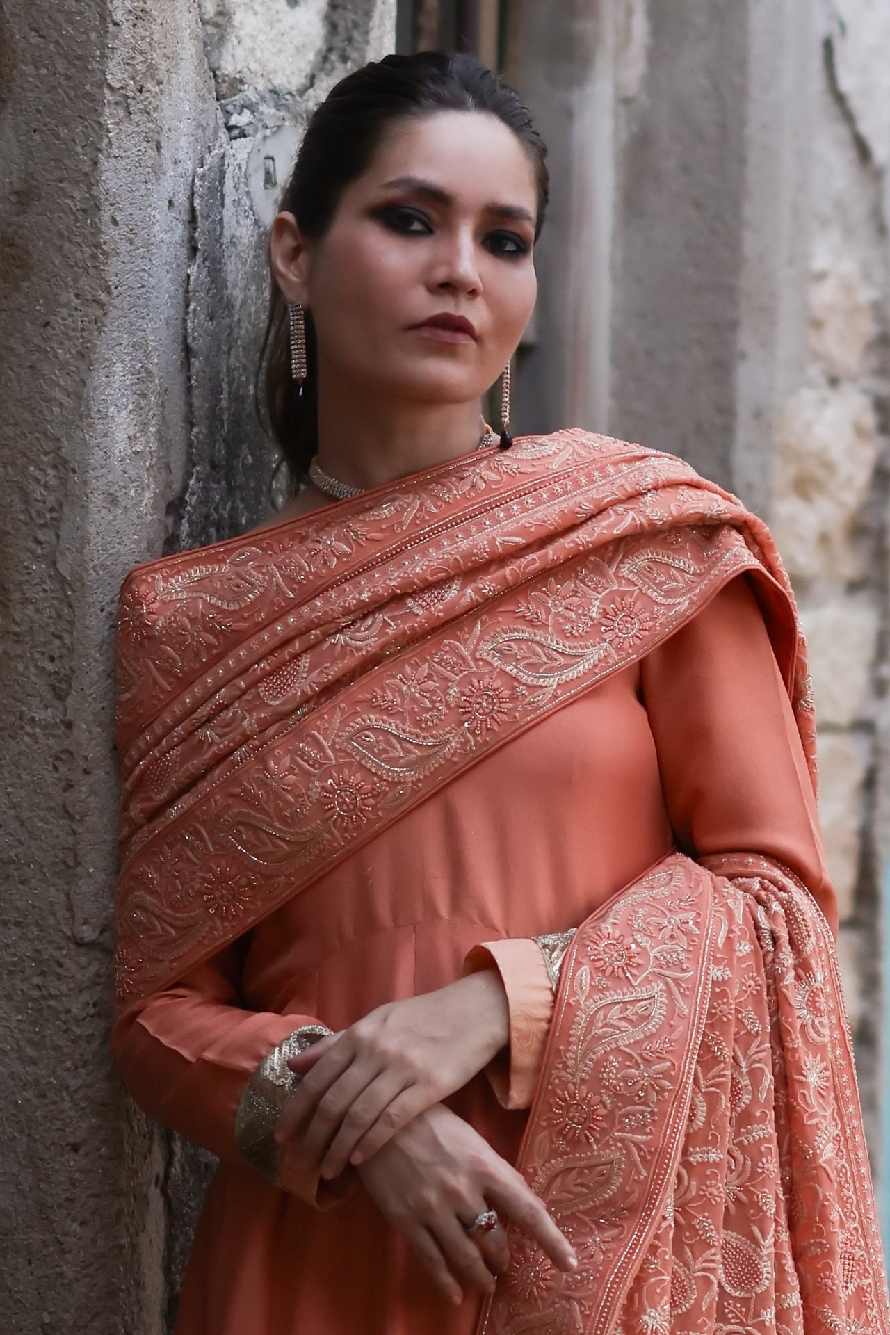 Aafrinish By Niazi Fahmeen Ansari Rizwan Ul Haq Burnt Orange Chikankari Chaadar & Peshwaz Stun in the rich hues of our Burnt Orange Chikankari chaadar Pakistan Fashion