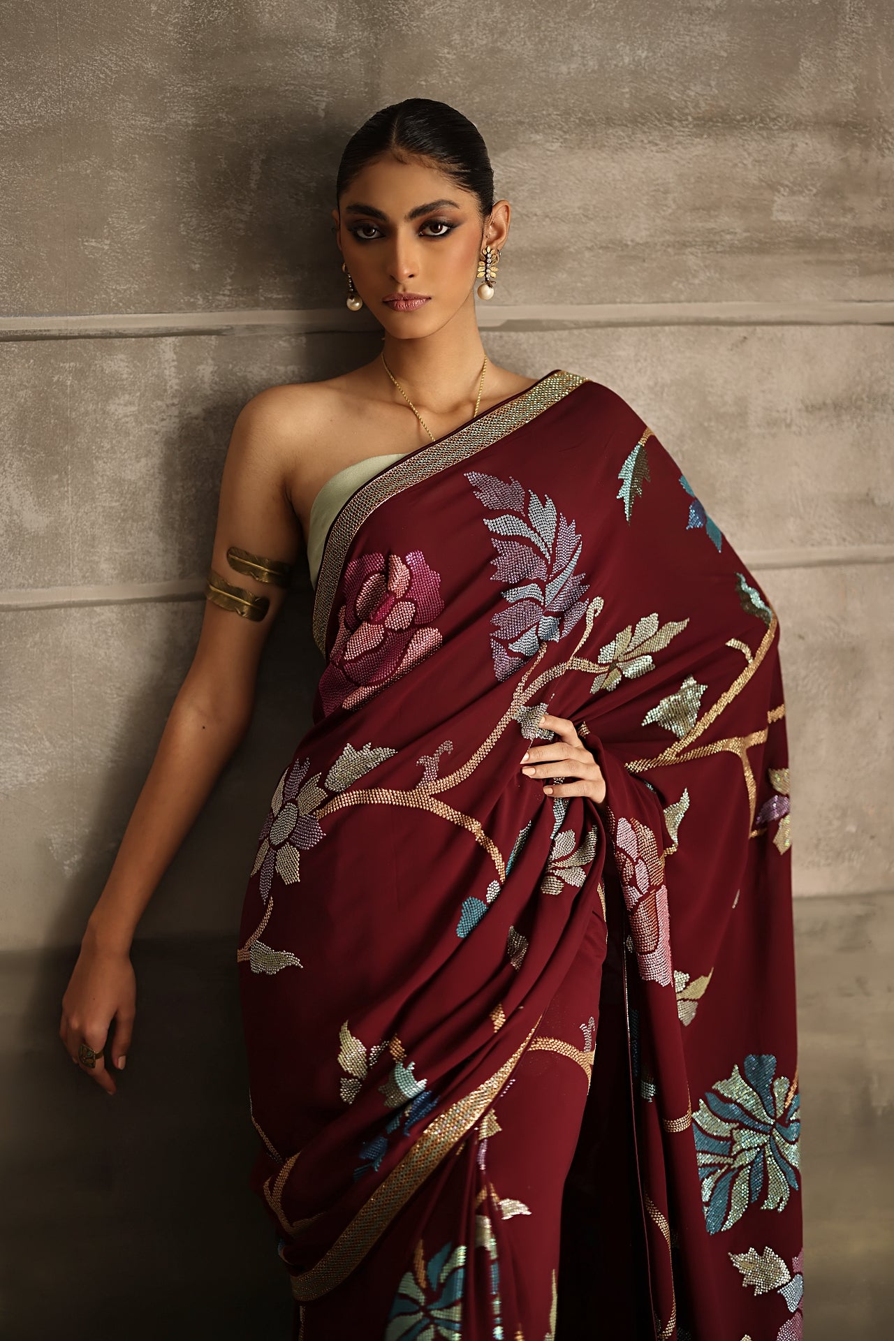 Aafrinish By Niazi Eshal Rahman Rizwan Ul Haq Deep Wine Cutdaana & Sequins Saree the rich hues of our deep wine Chiffon saree intricately detailed with floral motifs in glimmering sequins Pakistan Fashion