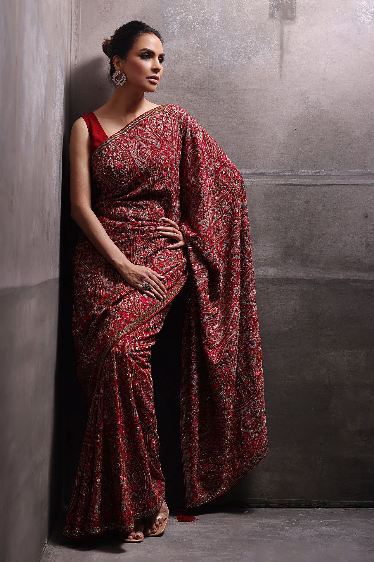 Aafrinish By Niazi Fouzia Aman Rizwan Ul Haq Red Kashidakari Sari embellished with intricately detailed resham threadwork, dull gold cut daana and Belgian rhinestone Pakistan Fashion