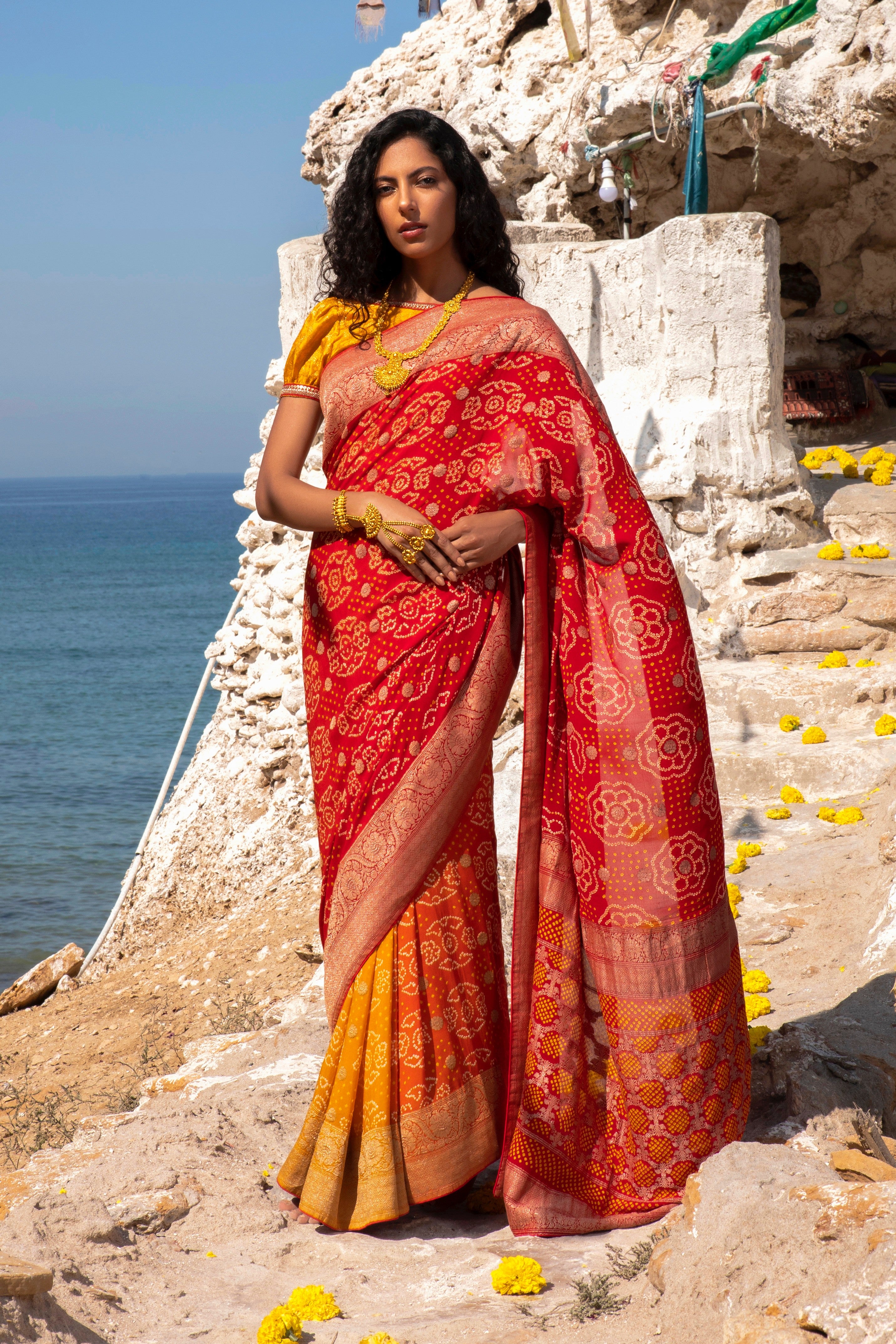 Aafrinish By Niazi Nimra Jacob Red, Spicy Orange and Saffron Yellow Saree Sari Beach Mubarak Village