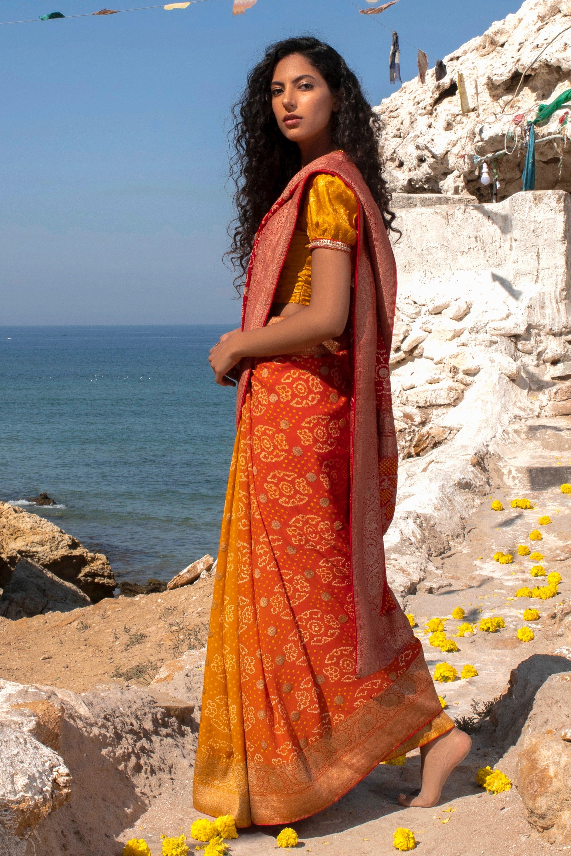 Aafrinish By Niazi Nimra Jacob Red, Spicy Orange and Saffron Yellow Saree Sari Beach Mubarak Village